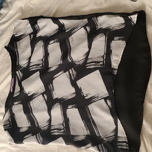 Blouse and longer in back by a little